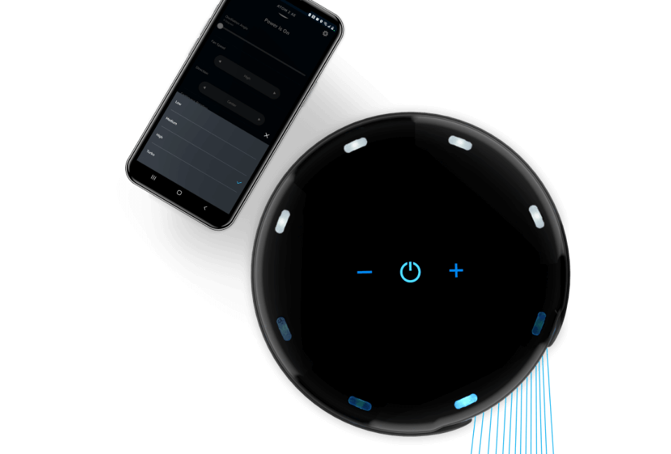 Atom 2W AE Compact Oscillating Tower Circulator with Wall Mount Controls with alexa opened on a phone next to it