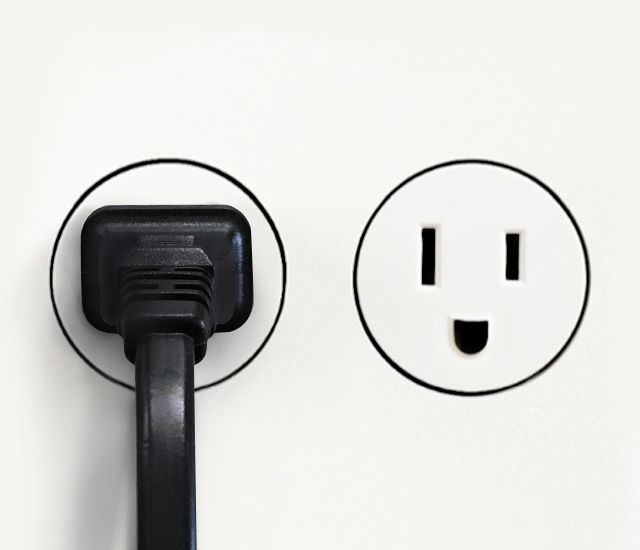 black plug in an outlet