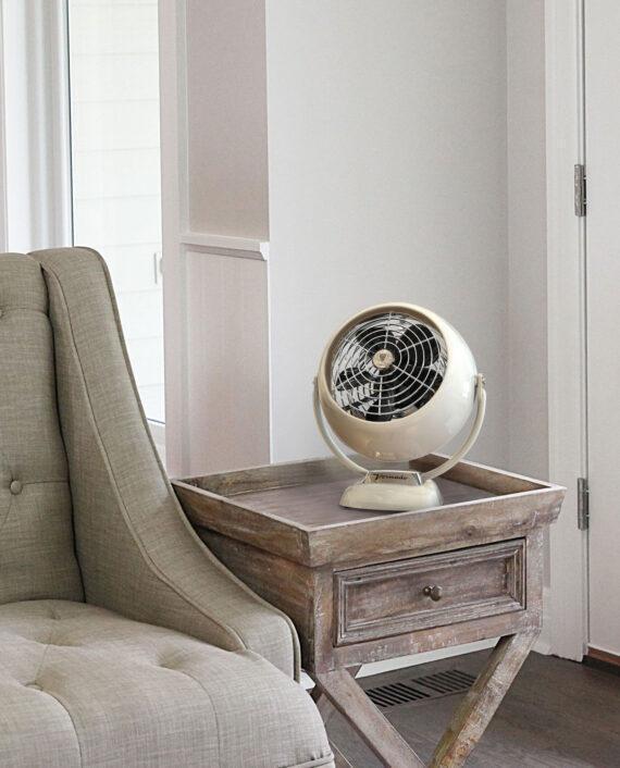 White VFAN Jr. Vintage Air Circulator on a wooden side table